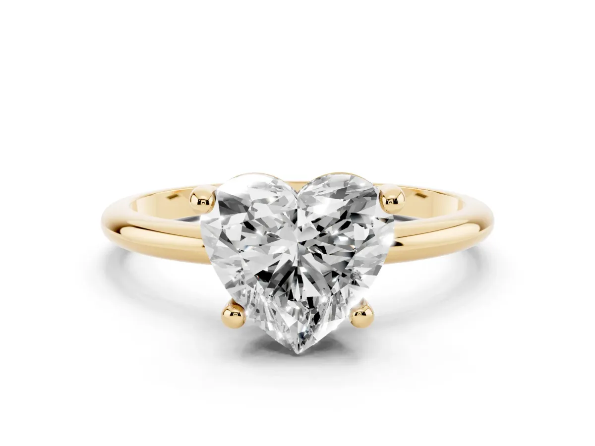Heart Cut Solitaire Diamond Ring with 4-Prong Setting on a Classic Band Yellow gold