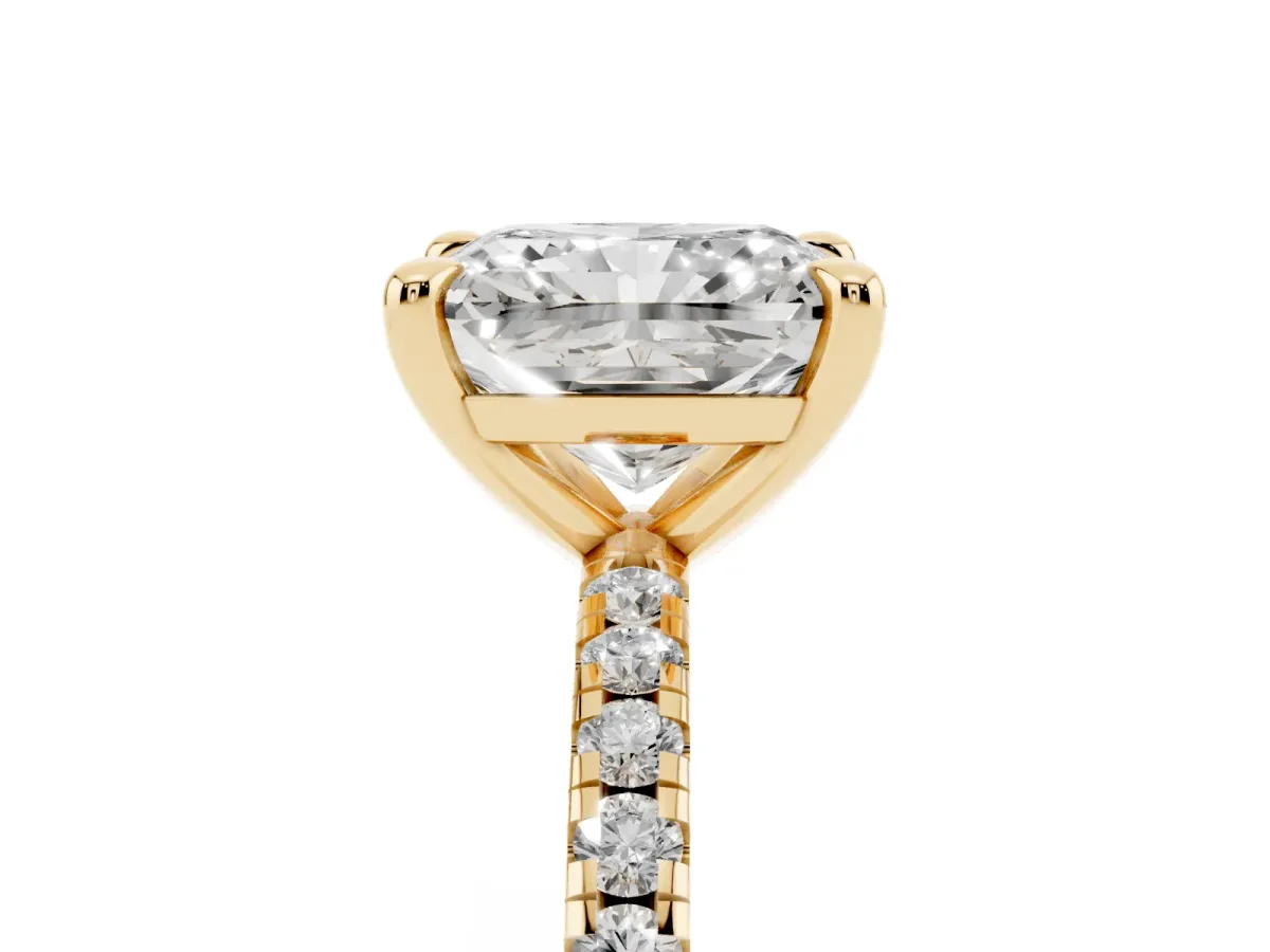 Radiant Cut Diamond Brilliant Solitaire Ring with Pavé Band and Four-Prong Setting Yellow gold