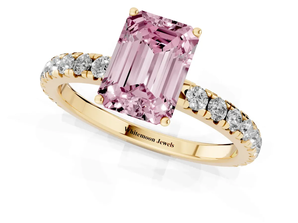 Fancy Pink Emerald Cut Diamond Pavé Solitaire Engagement Ring with Four-Prong Setting Yellow gold