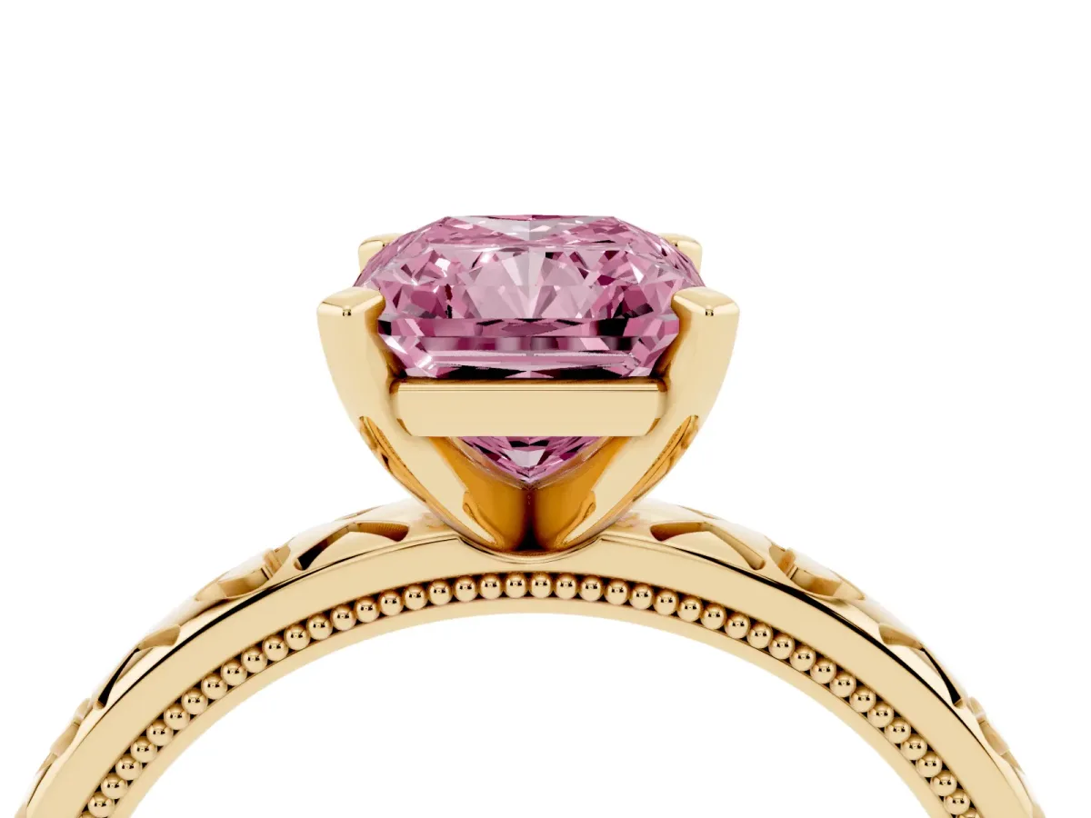Fancy Pink Radiant Cut Solitaire Diamond Engagement Ring with XO Engraved Band and Four-Prong Setting Yellow gold