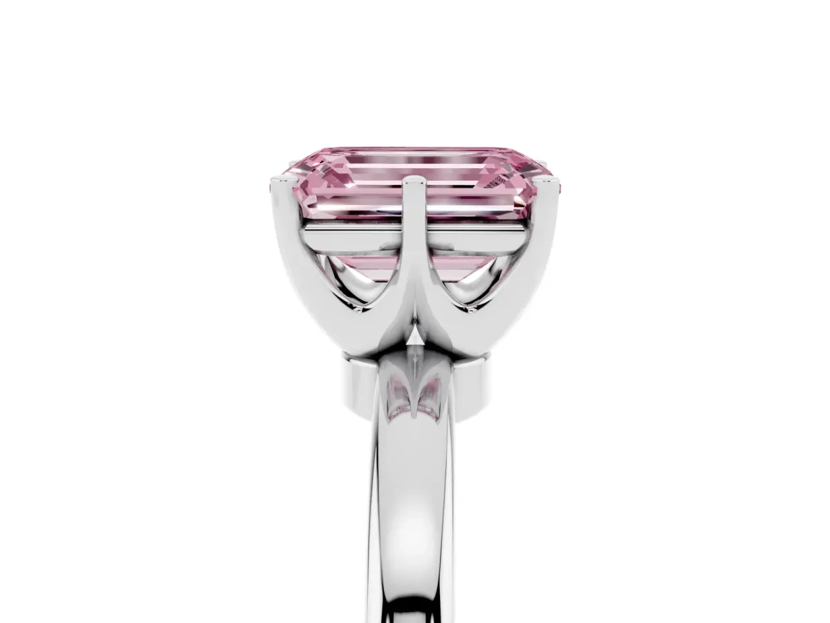 Fancy Pink Emerald Cut Solitaire Diamond Ring with Six-Prong Setting on a Classic Band Platinum
