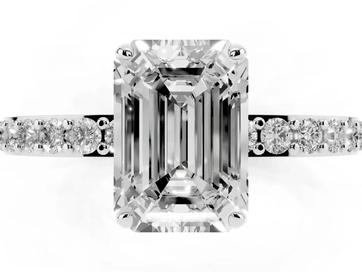 Emerald Cut Diamond Solitaire Engagement Ring with Pavé Band and Four-Prong Setting Platinum