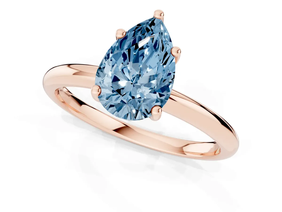 Fancy Blue Pear Cut Cut Solitaire Engagement Ring with Four-Prong Setting and Classic Band Rose gold