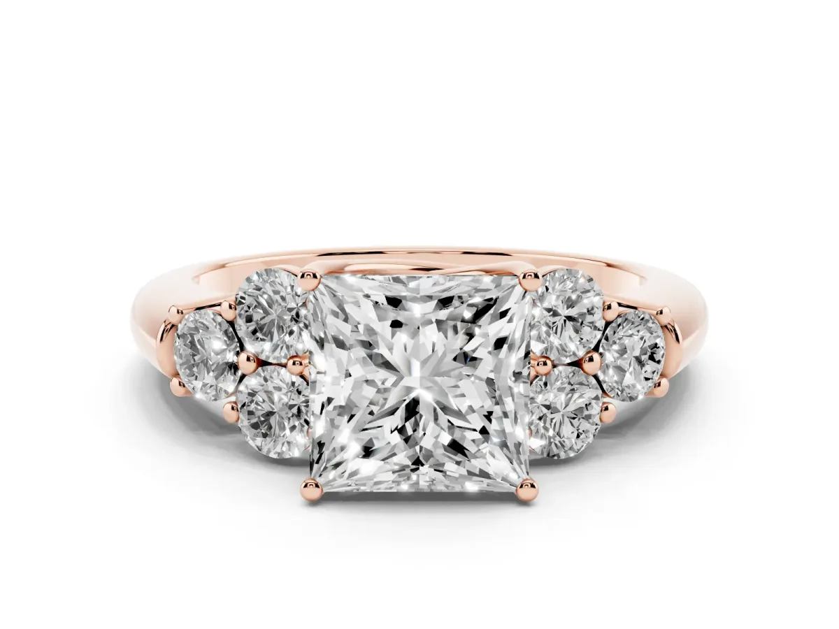 Princess Cut Cut Diamond Cluster Ring with Round Accent Stones and Prong Setting on a Classic Band Rose gold