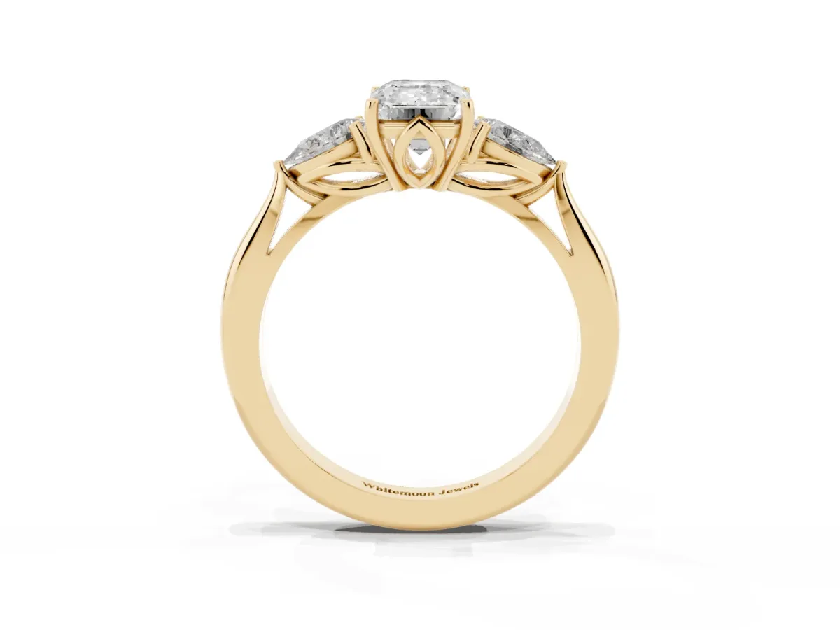 Three-Stone Emerald Cut Brilliant Diamond Solitaire Ring with Tapered Band and Four-Prong Setting Yellow gold