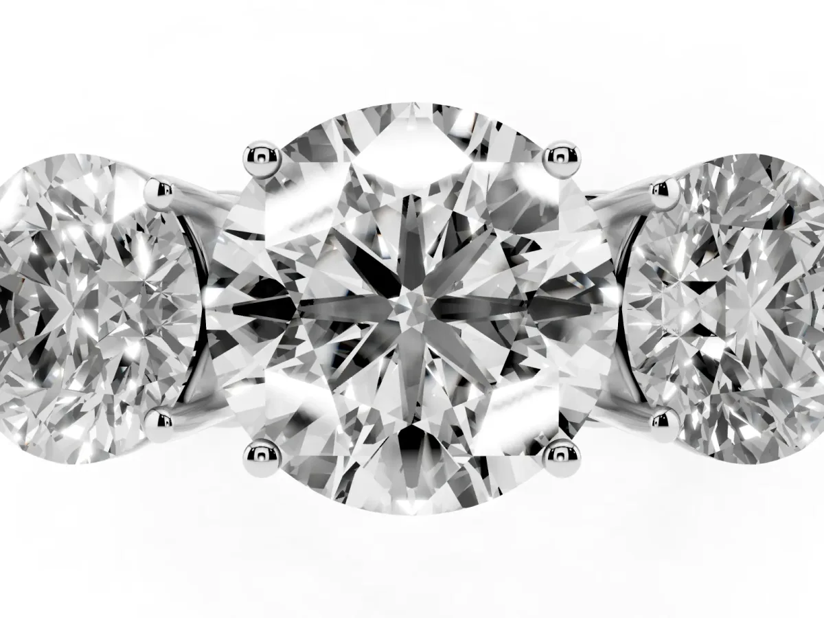 Round Cut Diamond Three-Stone Ring with Prong Setting and Textured Band Silver