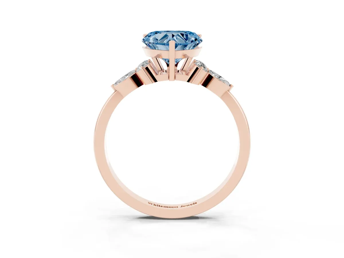 Fancy Blue Heart Cut Brilliant Diamond Solitaire Ring with Pear Side Stones and Four-Prong Setting Rose gold