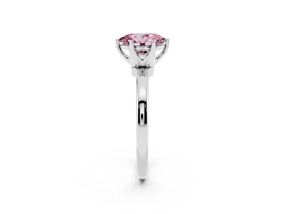 Fancy Pink Oval Cut Solitaire Diamond Ring with Six-Prong Setting on a Classic Band Silver