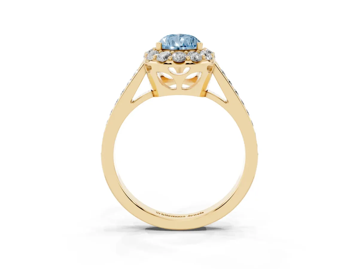 Fancy Blue Pear Cut Diamond Floral Halo Ring with Pavé Band and Prong Setting Yellow gold