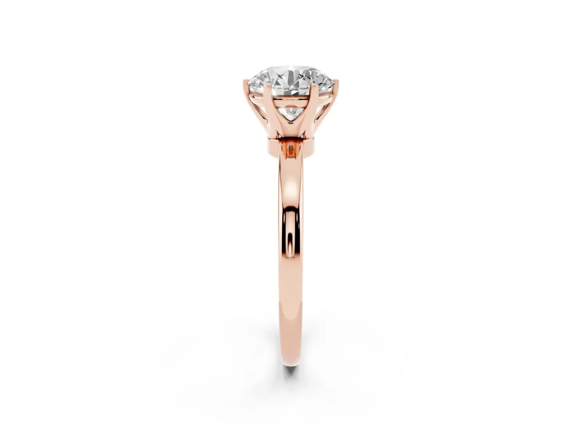 Round Cut Solitaire Diamond Ring with Six-Prong Setting on a Classic Band Rose gold