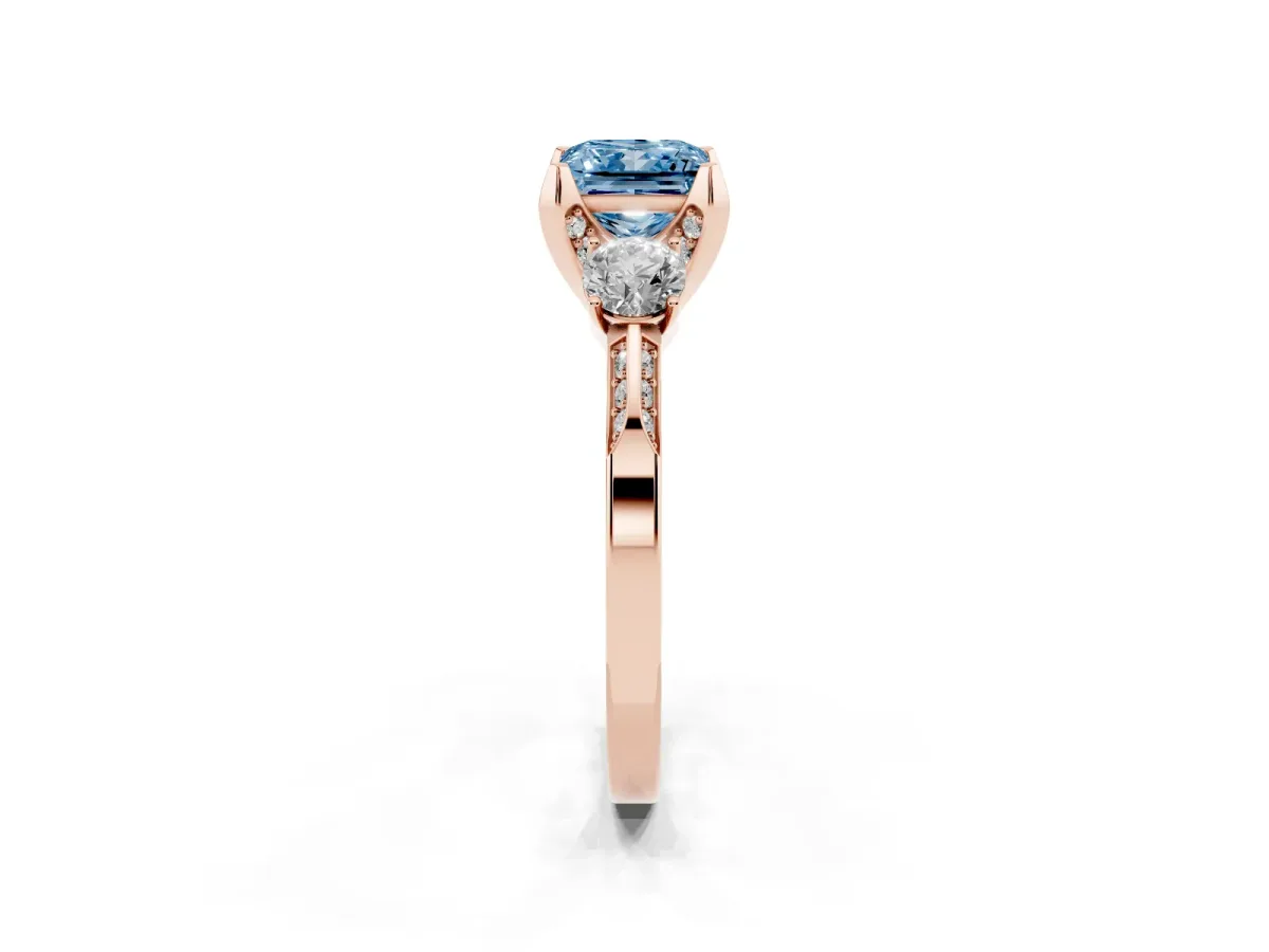 Fancy Blue Princess Cut Brilliant Three-Stone Diamond Ring with Pavé Band and Four-Prong Setting Rose gold