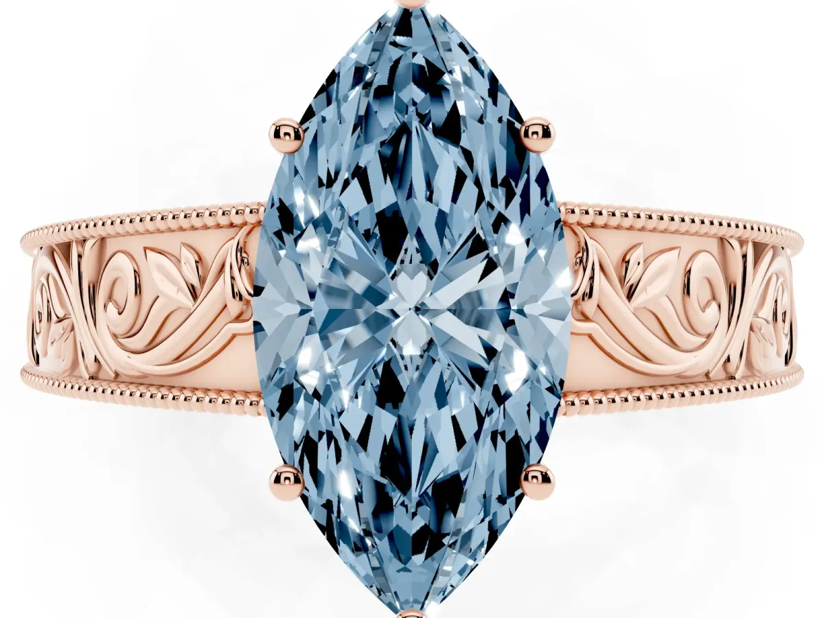 Fancy Blue Marquise Cut Diamond Solitaire Ring with Engraved Band and Four-Prong Setting Rose gold