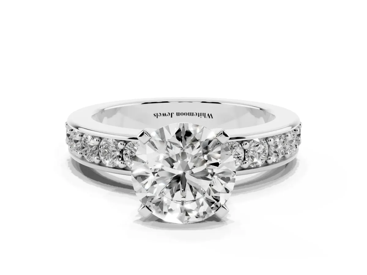 Round Cut Diamond Engagement Ring with Channel Set Round Band and Prong Setting Silver