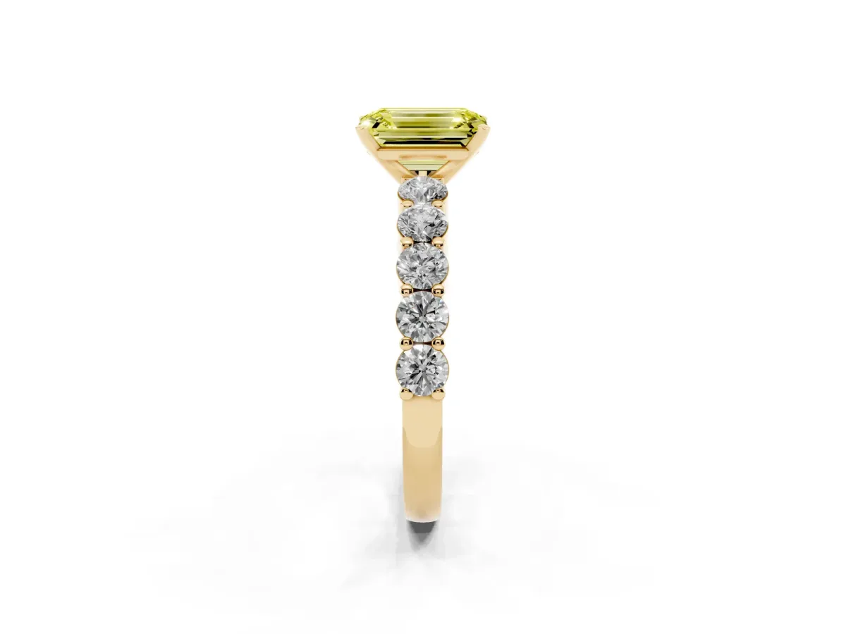 Fancy Yellow Emerald Cut Diamond Solitaire Ring with Shared Prong Round Side Stones Yellow gold