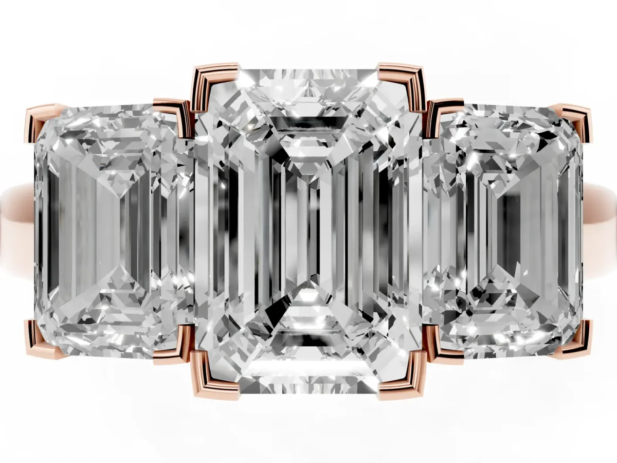 Three-Stone Emerald Cut Cut Diamond Ring with Channel Set Band and Four-Prong Setting Rose gold