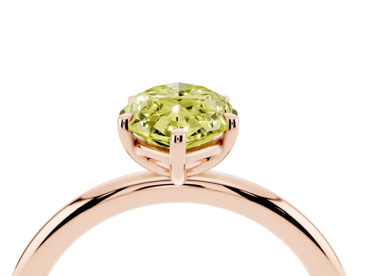 Fancy Yellow Oval Cut Solitaire Diamond Ring with Four-Prong Setting on a Plain Band Rose gold