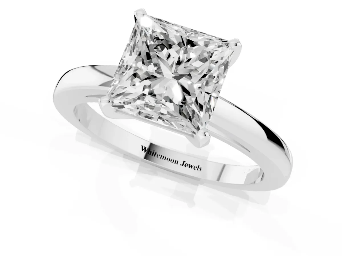 Princess Cut Solitaire Diamond Engagement Ring with Four-Prong Setting on a Classic Band Silver