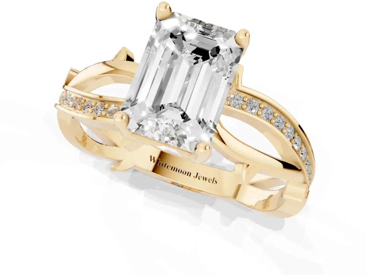 Emerald Cut Solitaire Twist Band with Pavé Accents and Four-Prong Setting Yellow gold