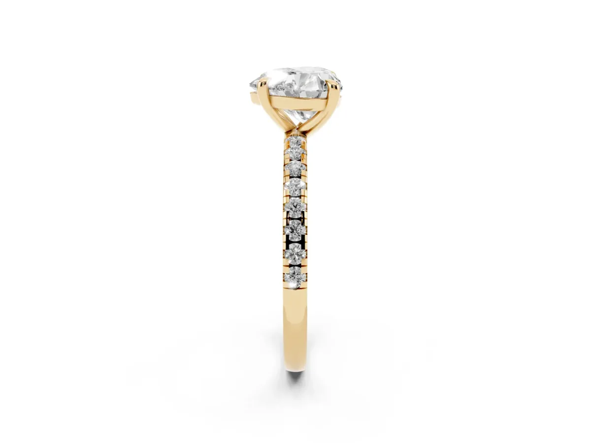 Heart Cut Diamond Brilliant Solitaire Ring with Pavé Band and Four-Prong Setting Yellow gold