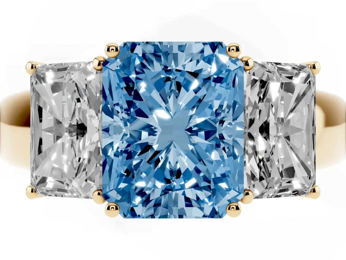 Fancy Blue Three-Stone Radiant Cut Cut Diamond Ring with Prong Setting and Classic Band Yellow gold