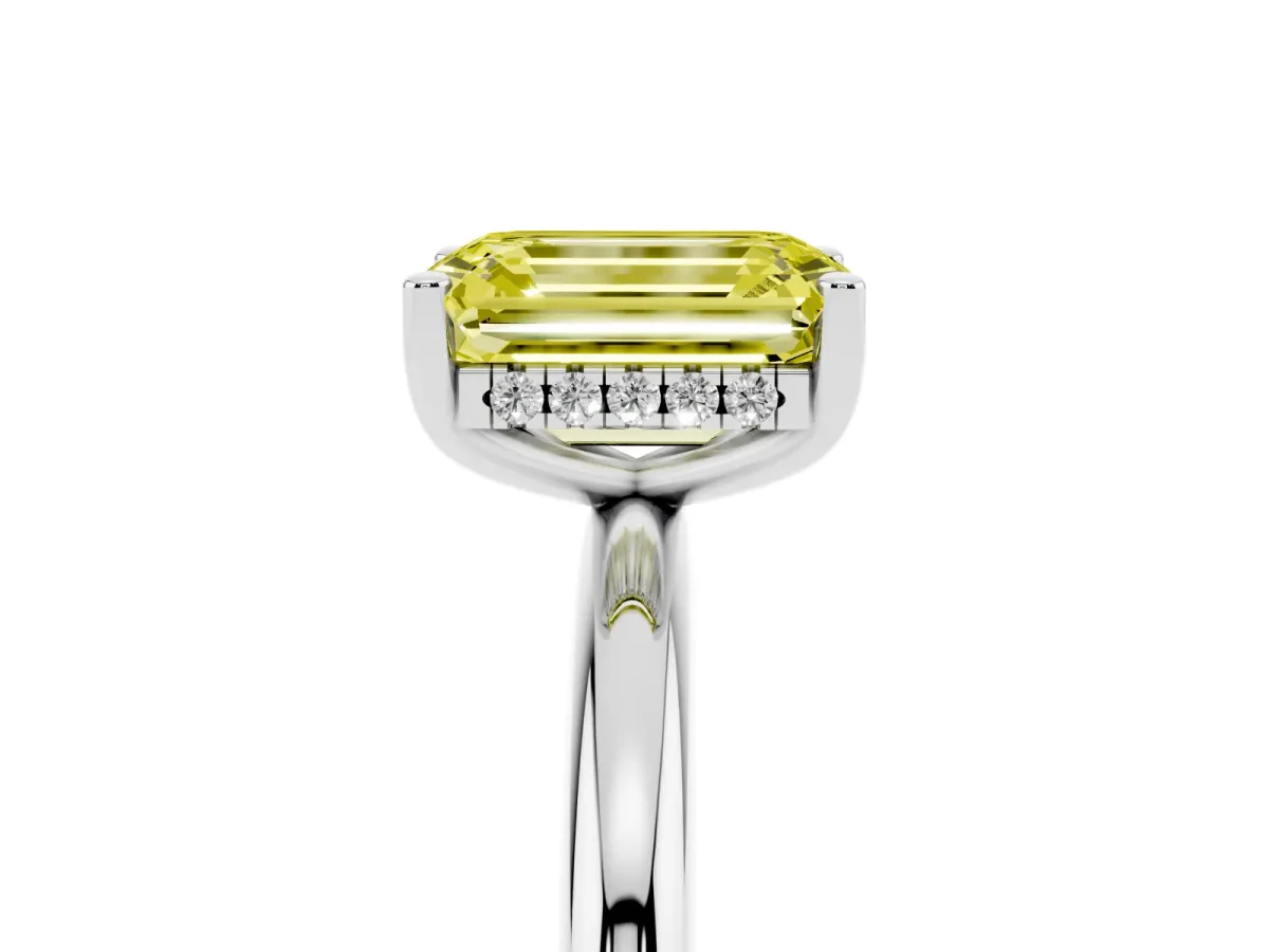 Fancy Yellow Emerald Cut Cut Solitaire Engagement Ring with Four-Prong Setting and Classic Band Silver