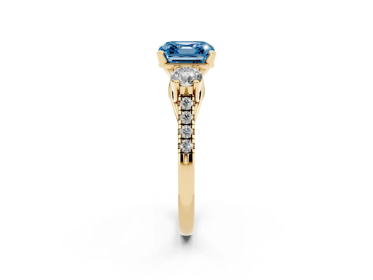 Fancy Blue Three-Stone Asscher Cut Diamond Pavé Band with Four-Prong Setting Yellow gold