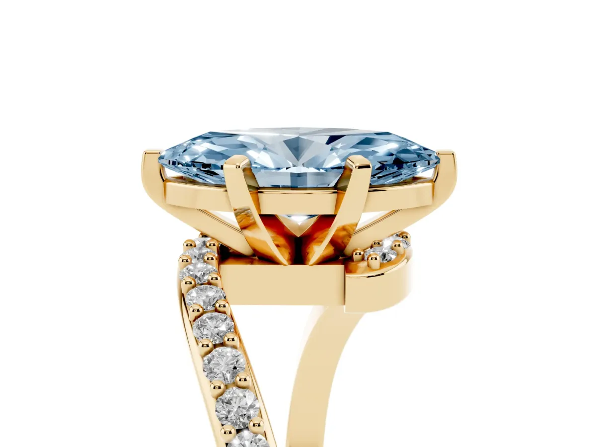 Fancy Blue Marquise Cut Solitaire Twist Band with Pave Set Diamonds and Four-Prong Setting Yellow gold