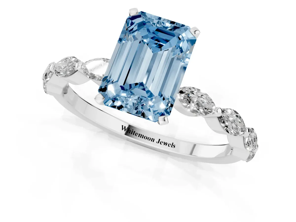 Fancy Blue Emerald Cut Diamond Ring with Marquise Side Stones and Prong Setting Platinum