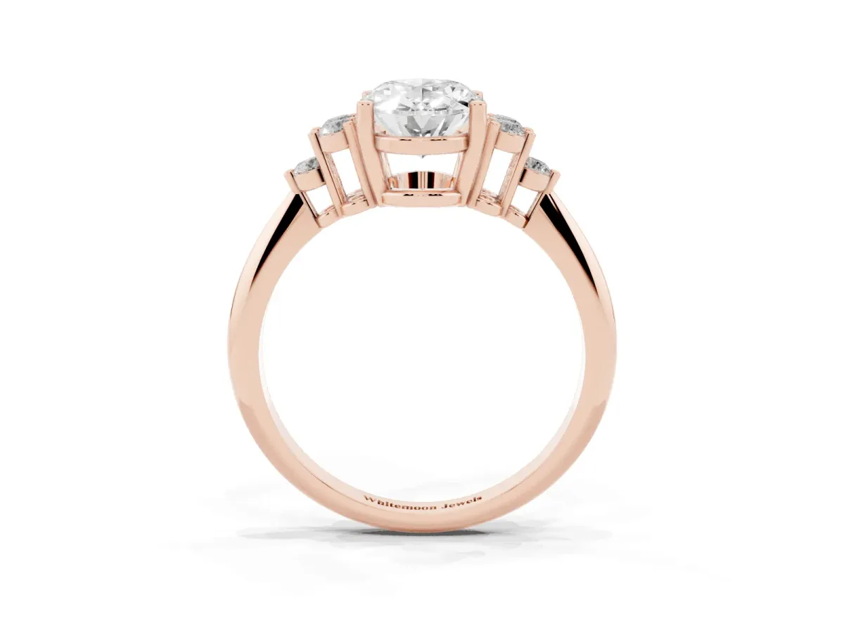 Oval Cut Cut Diamond Cluster Ring with Solitaire Band and Four-Prong Setting Rose gold