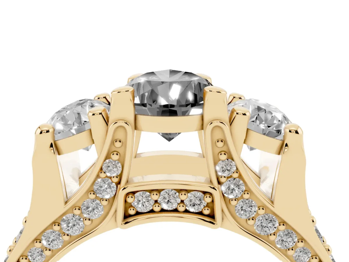 Fancy Black Pear Cut Diamond Three-Stone Ring with Channel Set Band and Four-Prong Setting Yellow gold