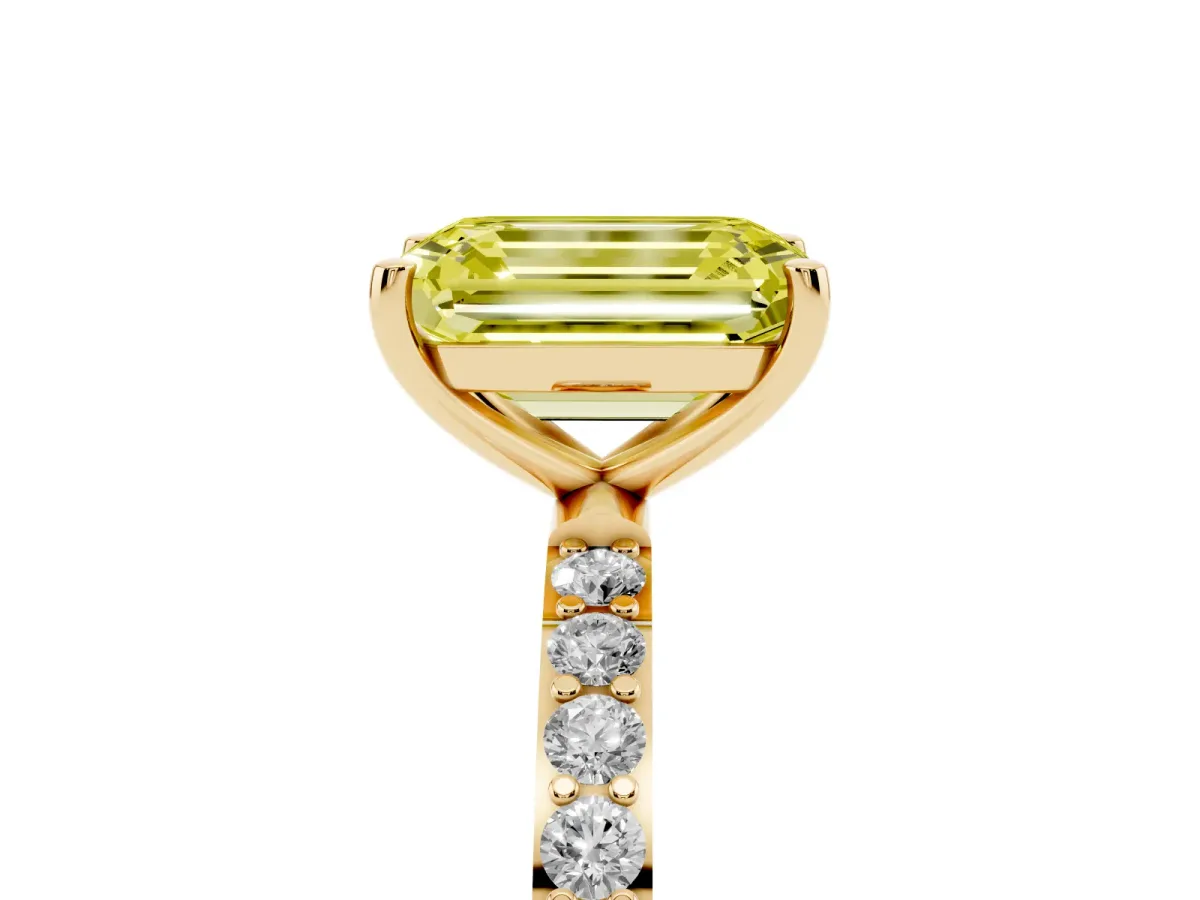 Fancy Yellow Emerald Cut Diamond Solitaire Ring with Round Pavé Shoulders and Prong Setting Yellow gold