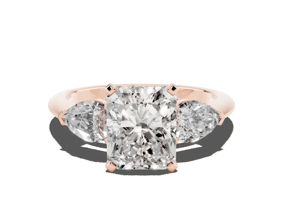 Three-Stone Radiant Cut Diamond Ring with Pear Side Stones and Four-Prong Setting Rose gold