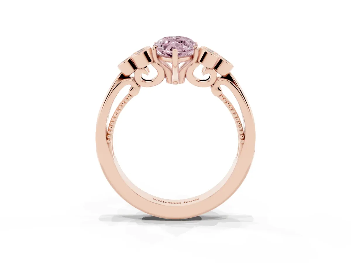 Fancy Pink Marquise Cut Cut Diamond Engagement Ring with Bezel Set Round Side Stones and Prong Setting Rose gold