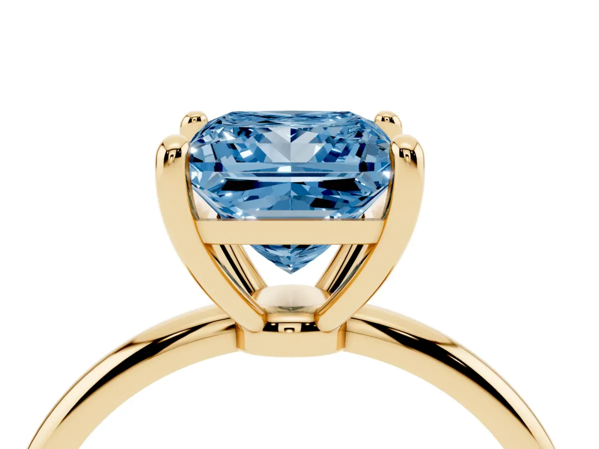 Fancy Blue Princess Cut Solitaire Diamond Ring with 4-Prong Setting on a Classic Band Yellow gold