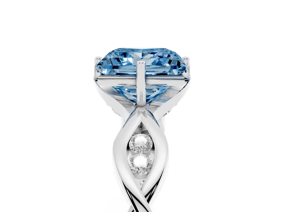 Fancy Blue Princess Cut Solitaire Twist Band with Leaf Prong Setting Silver