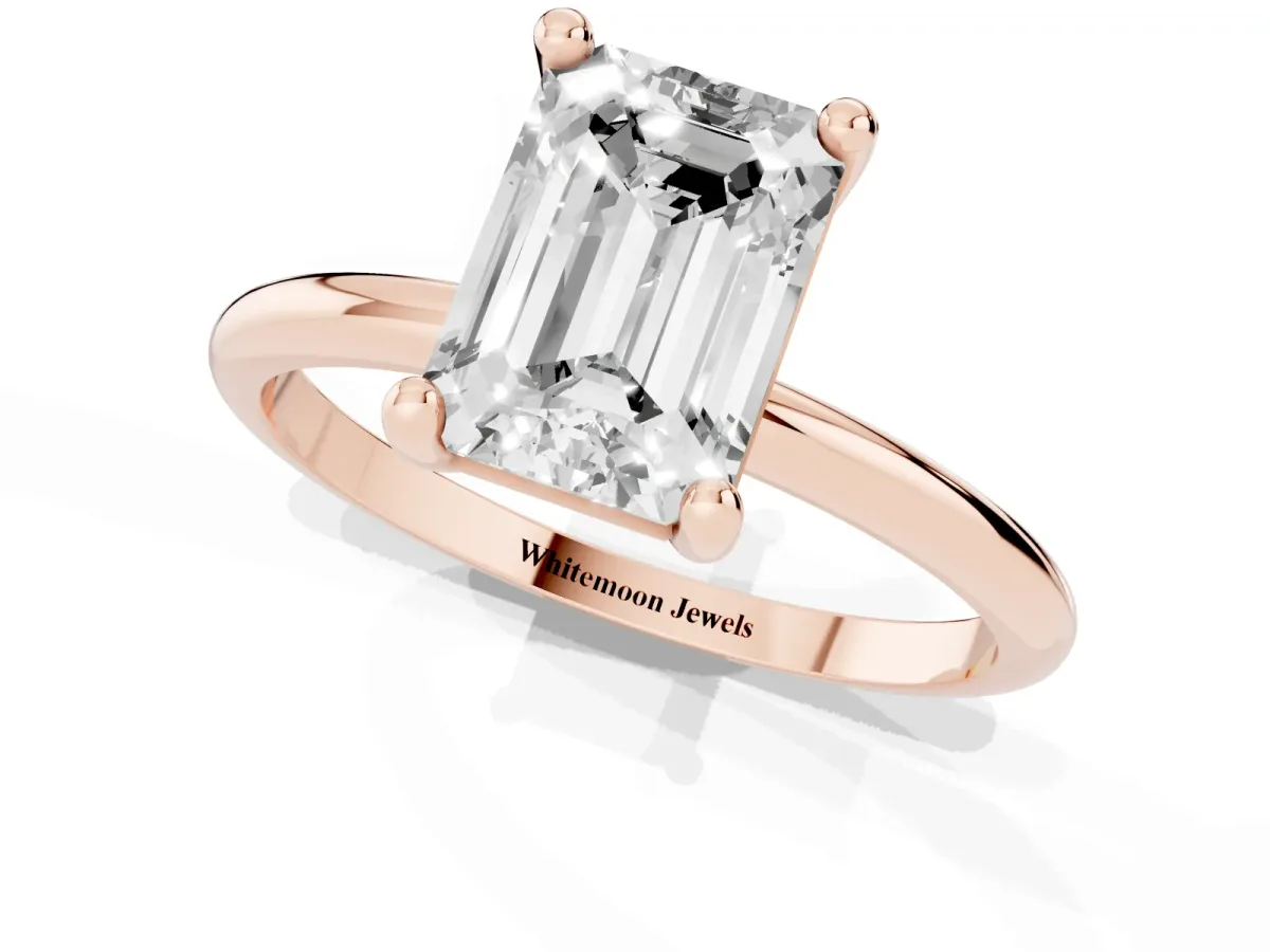 Emerald Cut Solitaire Diamond Ring with 4-Prong Setting on a Classic Band Rose gold