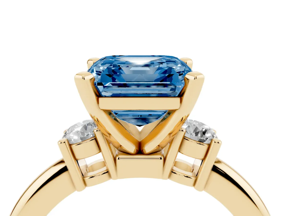 Fancy Blue Three-Stone Asscher Cut Cut Diamond Solitaire with Prong Setting and Classic Band Yellow gold