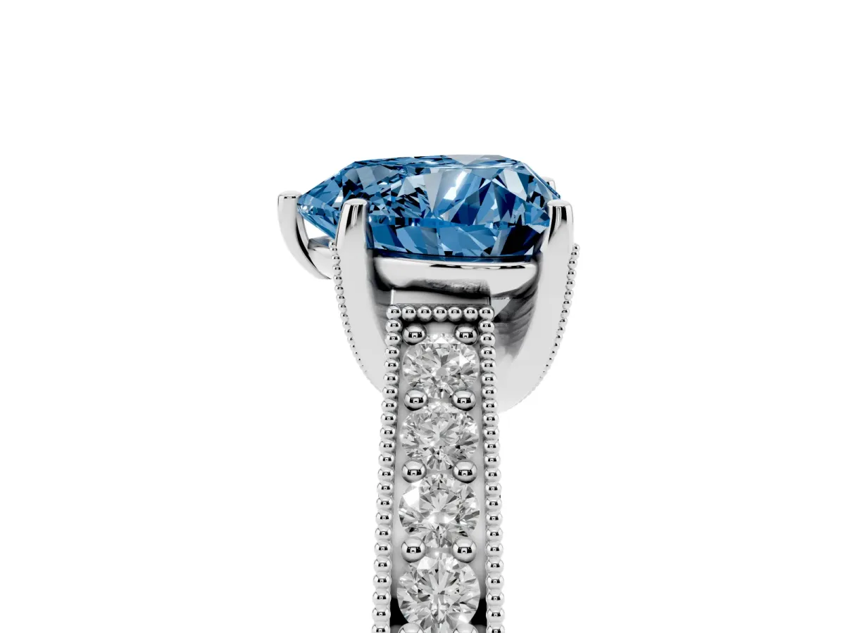 Fancy Blue Heart Cut Cut Diamond Solitaire Ring with Milgrain Pave Band and Four Prong Setting Platinum