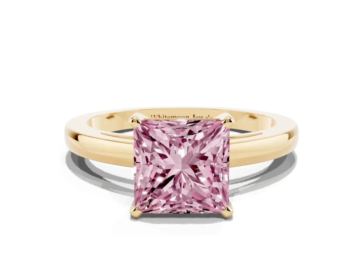 Fancy Pink Princess Cut Solitaire Diamond Engagement Ring with Four-Prong Setting on a Classic Band Yellow gold