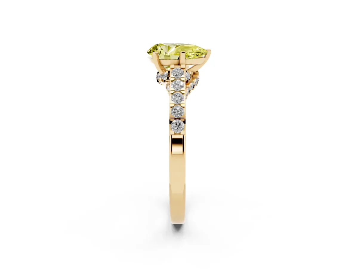 Fancy Yellow Pear Cut Diamond Solitaire Ring with Crossover Gallery and Round Pavé Band Yellow gold