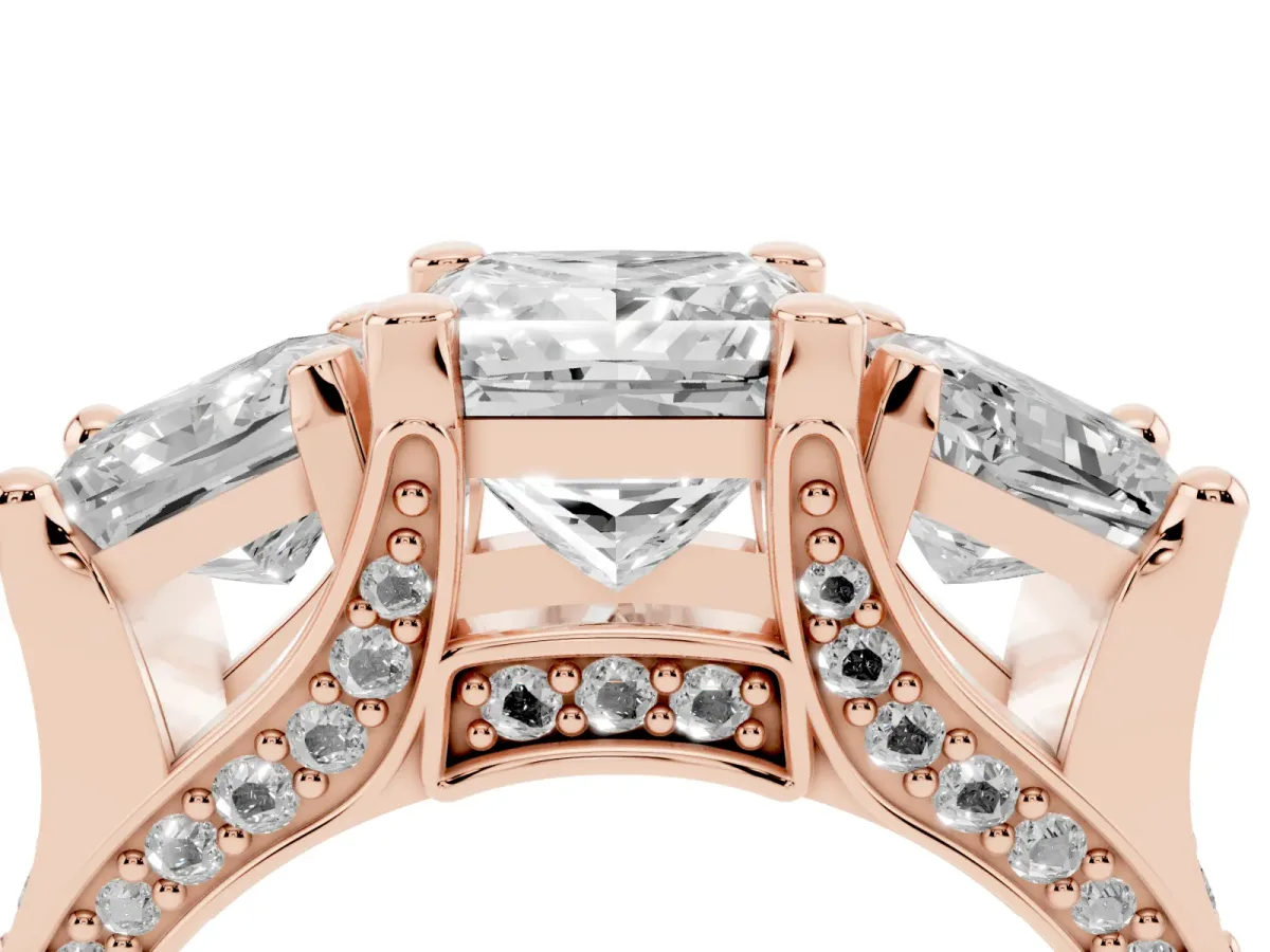 Princess Cut Diamond Three-Stone Ring with Channel Set Band and Four-Prong Setting Rose gold