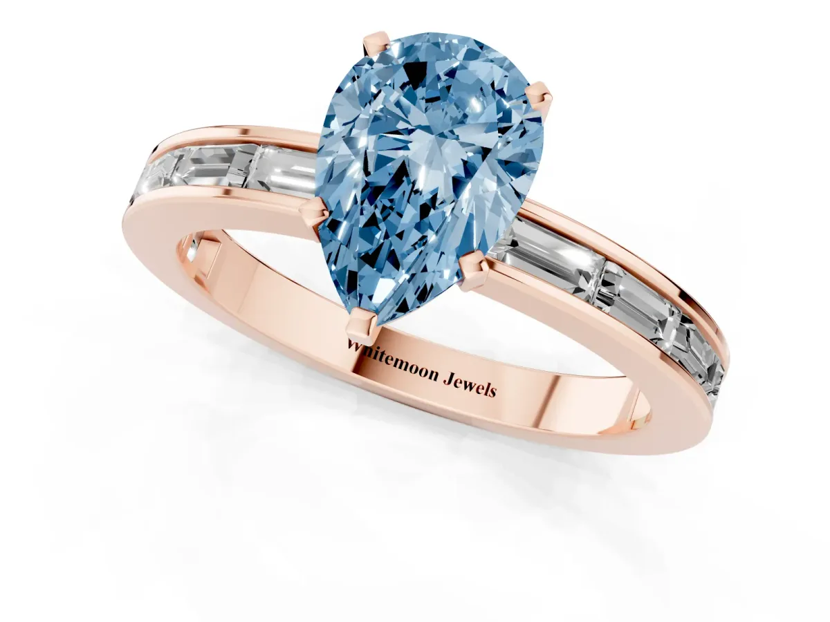 Fancy Blue Pear Cut Solitaire Diamond Ring with Channel-Set Baguette Band and Four-Prong Setting Rose gold