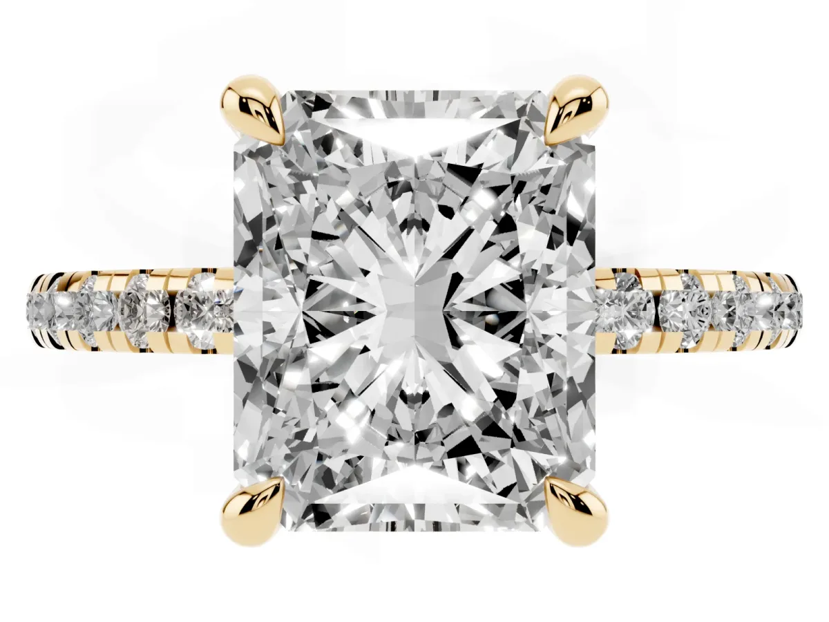 Radiant Cut Diamond Brilliant Solitaire Ring with Pavé Band and Four-Prong Setting Yellow gold