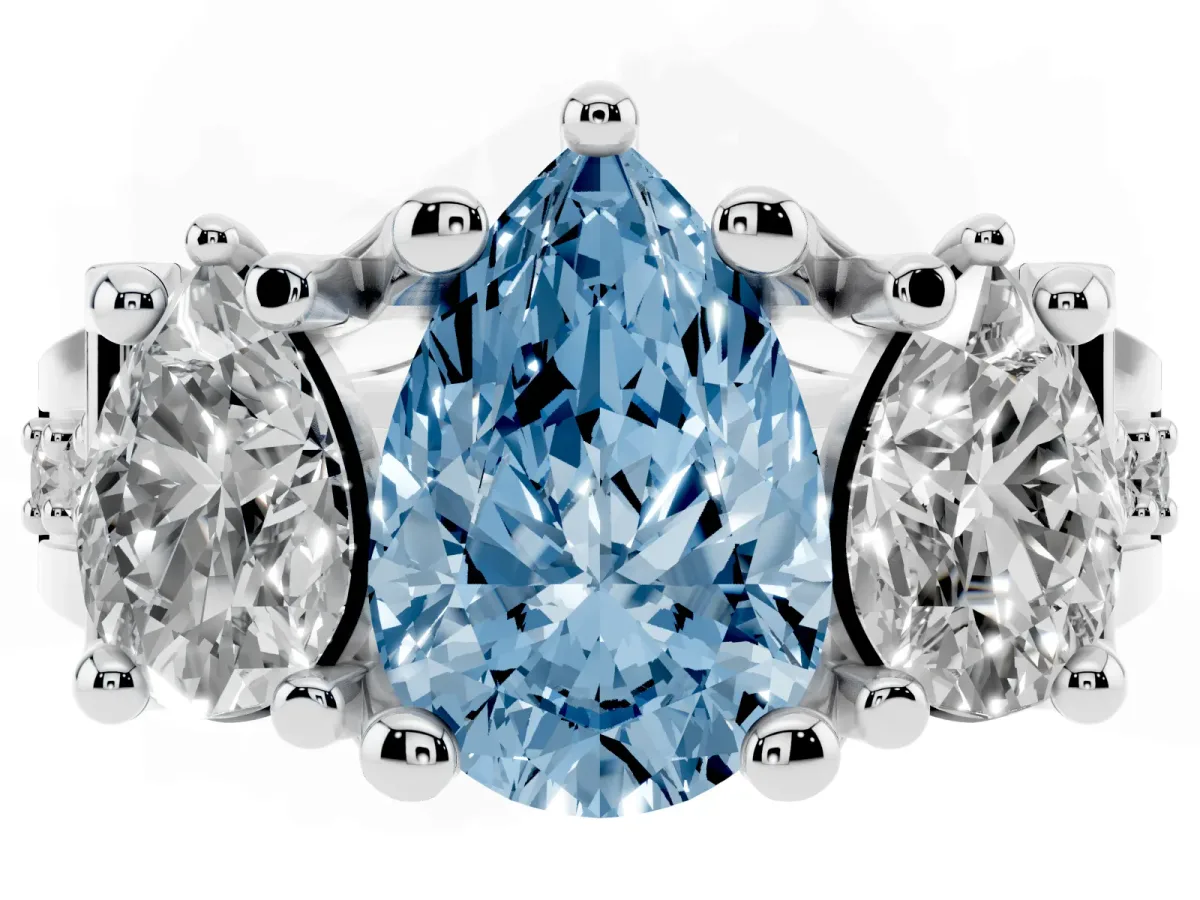 Fancy Blue Pear Cut Diamond Three-Stone Ring with Channel Set Band and Four-Prong Setting Silver