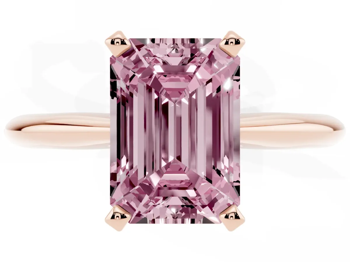Fancy Pink Emerald Cut Cut Solitaire Ring with Four-Prong Setting on a Classic Band Rose gold