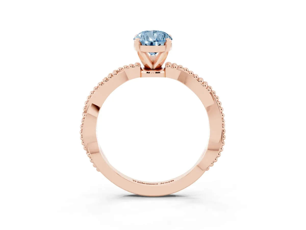 Fancy Blue Pear Cut Solitaire Twisted Band with Bead Prong Setting Rose gold