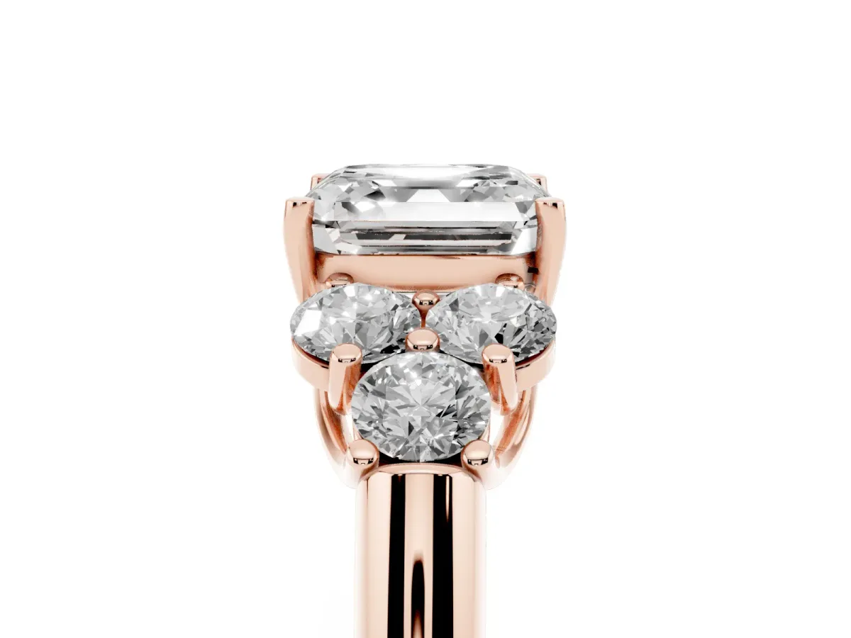 Asscher Cut Cut Diamond Cluster Ring with Round Accent Stones and Prong Setting on a Classic Band Rose gold