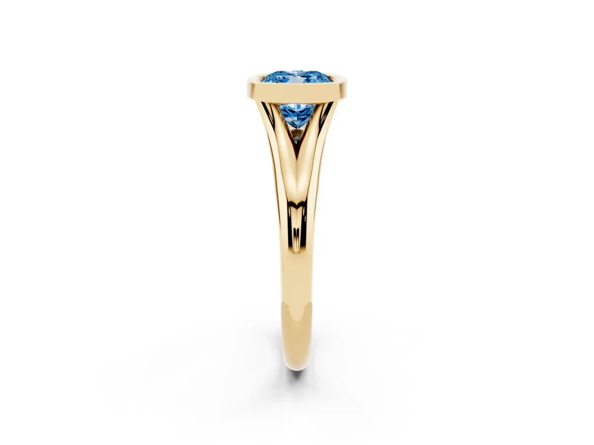 Fancy Blue Bezel Set Cushion Cut Solitaire Diamond Ring with Smooth Band Yellow gold
