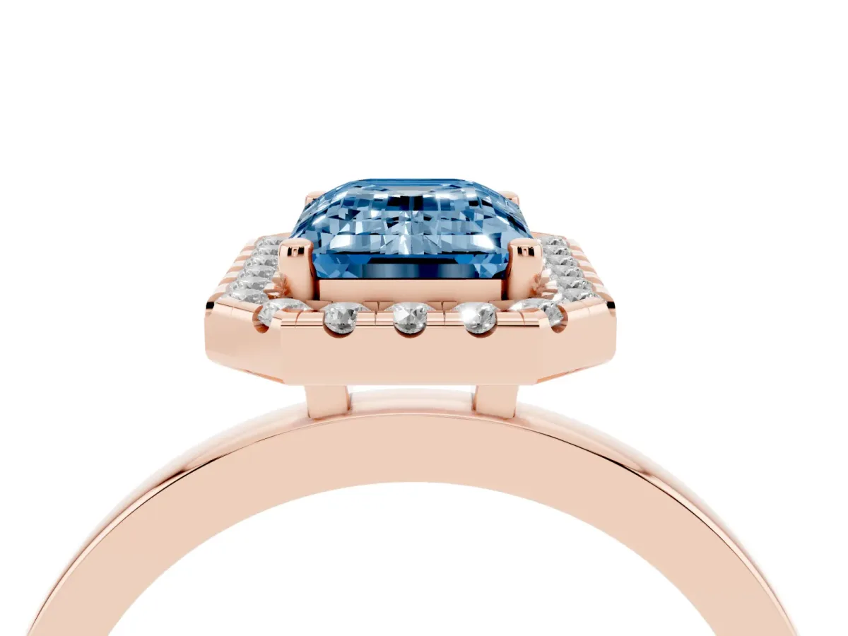 Fancy Blue Emerald Cut Halo Diamond Solitaire with Pavé Band and Four-Prong Setting Rose gold