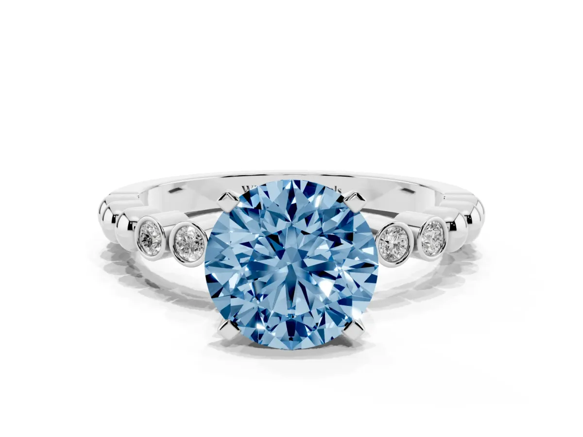 Fancy Blue Round Cut Solitaire Bezel Accent Diamond Engagement Ring with Beaded Band and Four-Prong Setting Silver